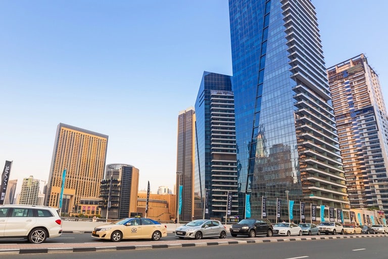 Unlocking the Connection: The Impact of Flat Prices in Downtown Dubai on Insurance in Real Estate