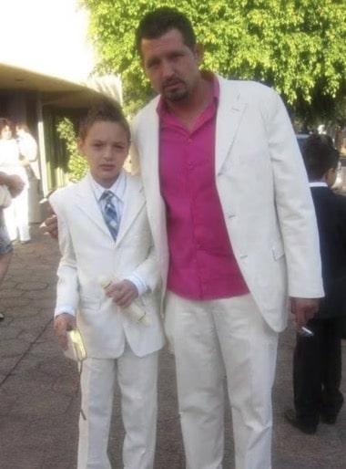 A photo of Peso Pluma and his father Hassan Kabande Toledo when he was a child